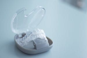 Orthodontic clear aligners in their case